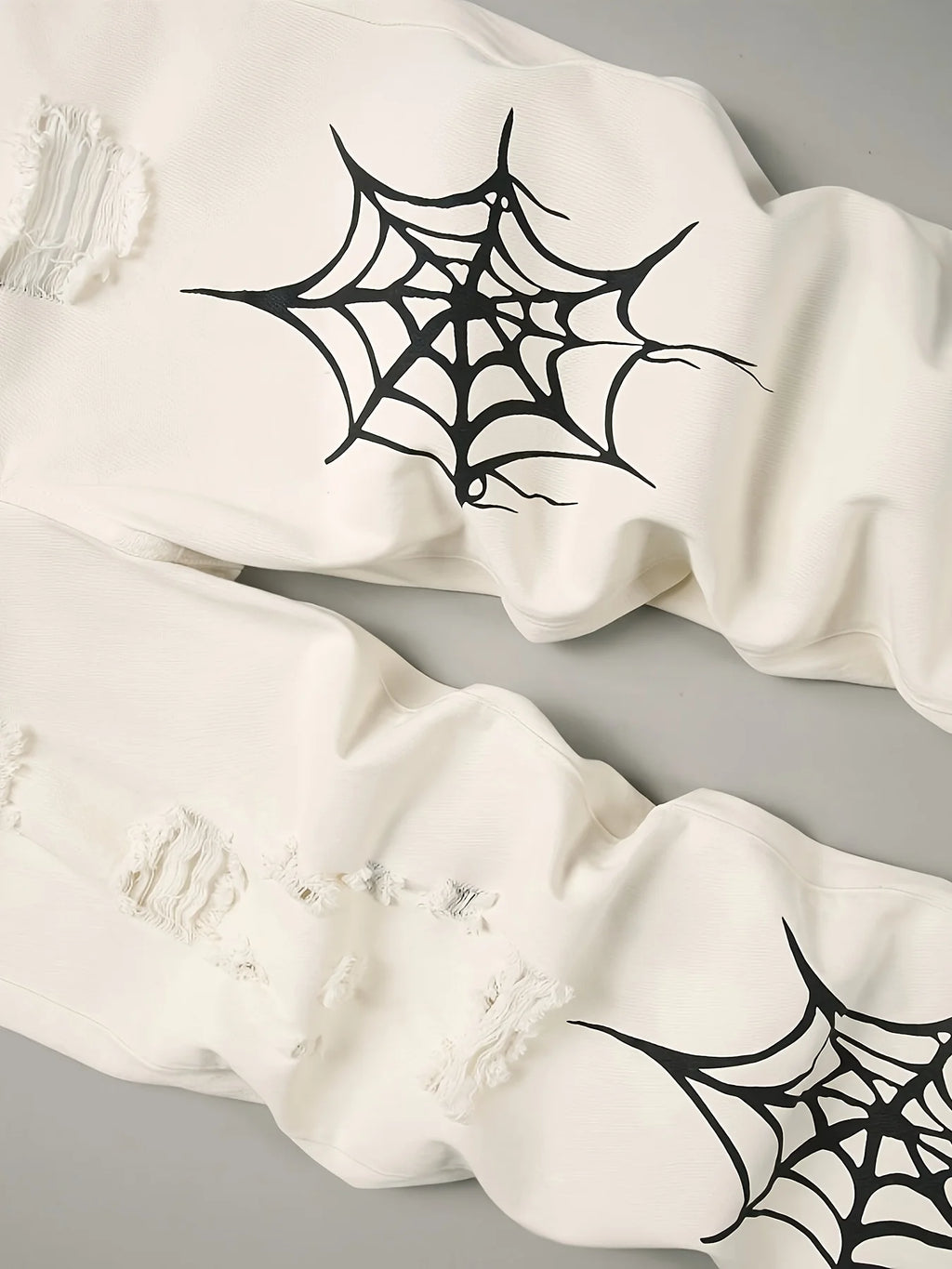 Distressed Spider Web Jeans